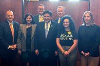 a photo of Governor Pritzker and the housing roundtable participants, including AHIL co-lead Steffany Bahamon