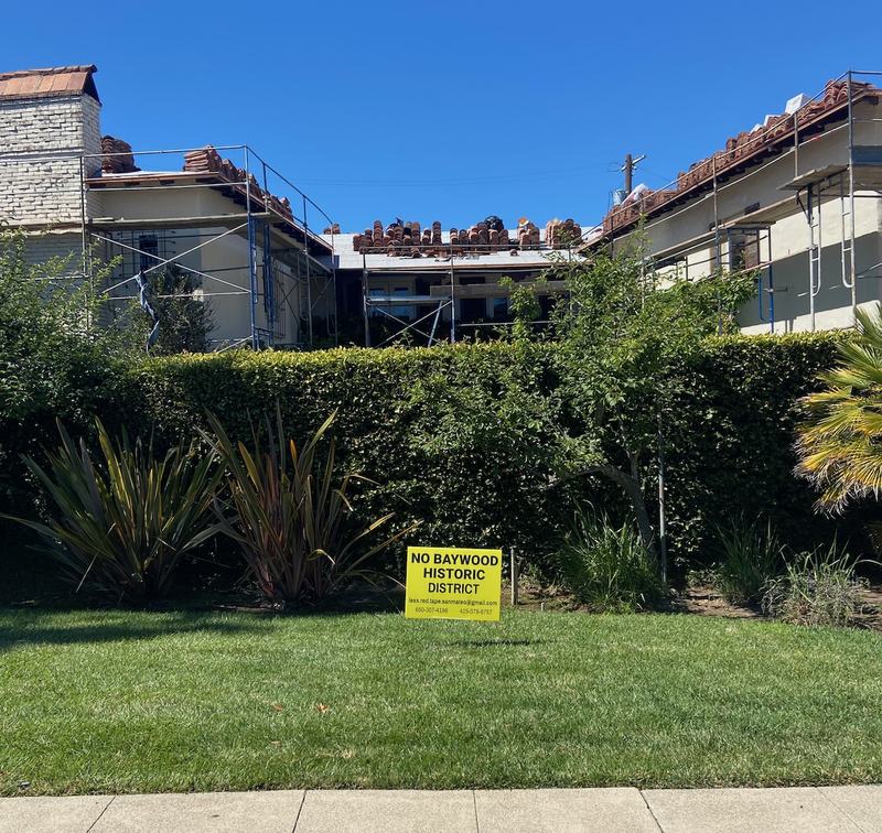 No Baywood Historic District sign in front of a construction site
