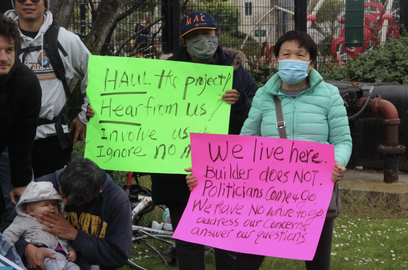NIMBYs protesting w/ signs