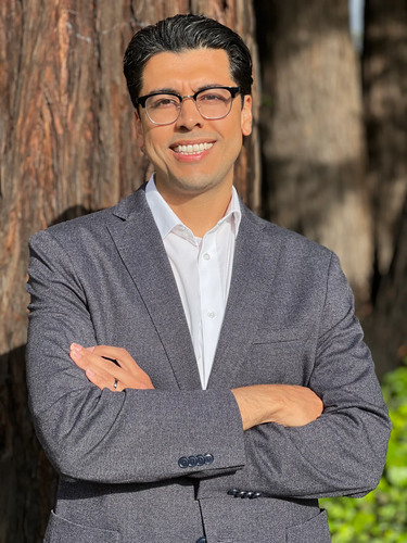 Tony Nunez in front of redwood tree