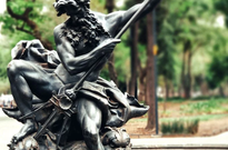 statue of poseidon in a fountain