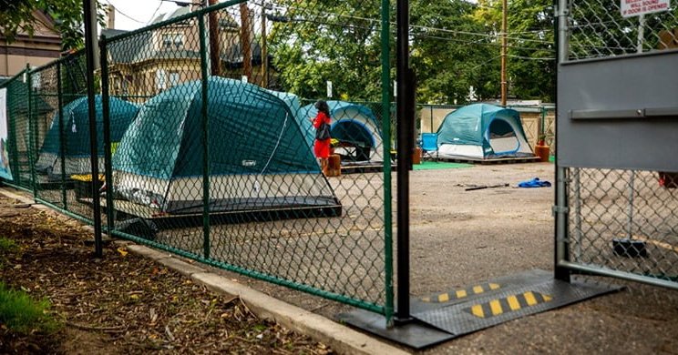 mock-up of sancitoned campsite in parking lot of Belong Church in North Capitoll Hill